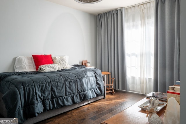 bedroom featuring wood-type flooring