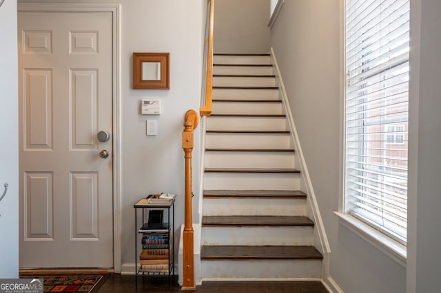 stairway with baseboards