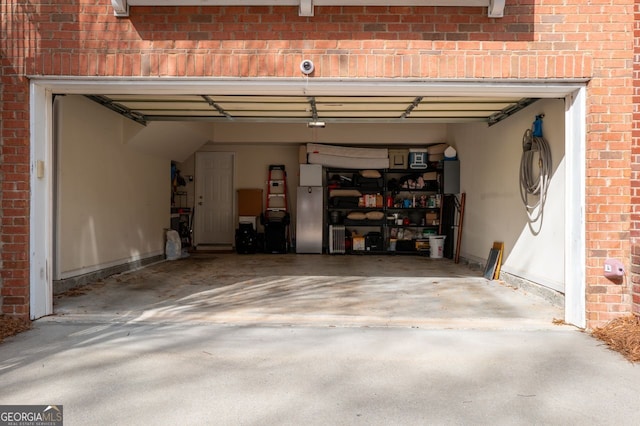 garage featuring driveway