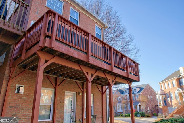 exterior space with brick siding