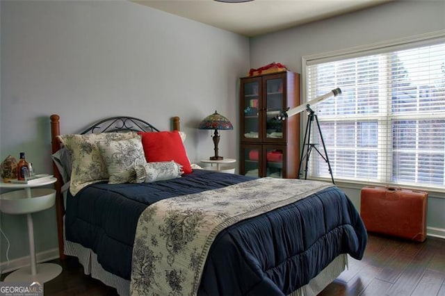 bedroom featuring wood finished floors