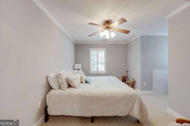 bedroom with ceiling fan, baseboards, light colored carpet, and ornamental molding