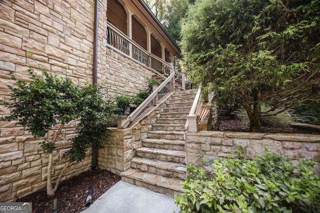 view of property exterior with stairway