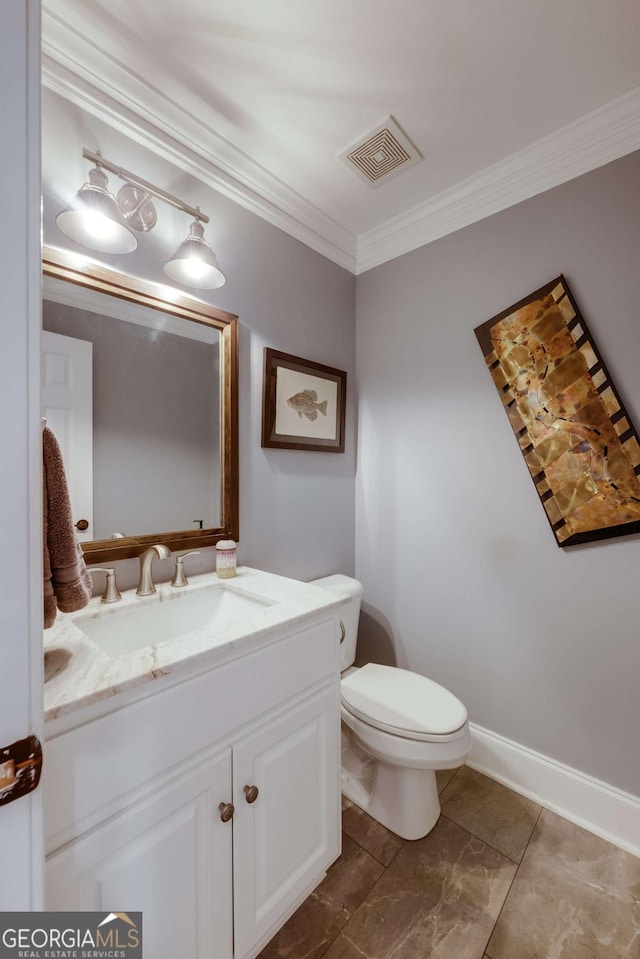 half bathroom featuring visible vents, crown molding, baseboards, toilet, and vanity