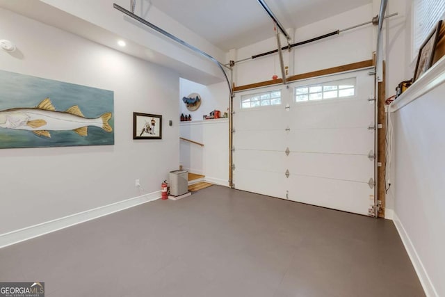 garage featuring baseboards