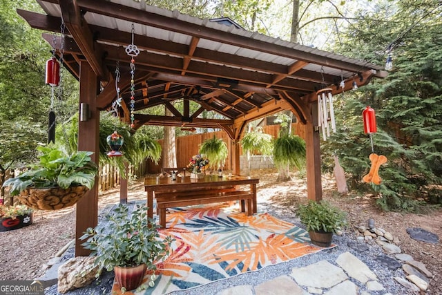 view of patio featuring a gazebo and fence