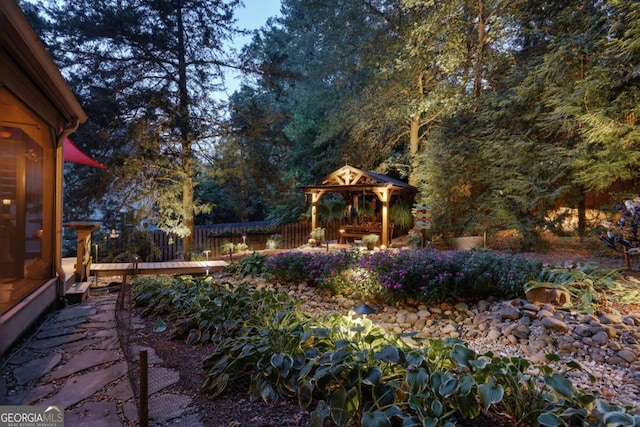 view of yard with a gazebo and fence