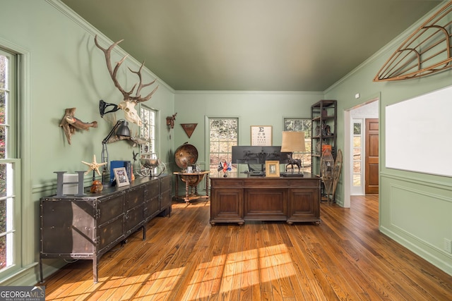 office area with hardwood / wood-style floors and crown molding