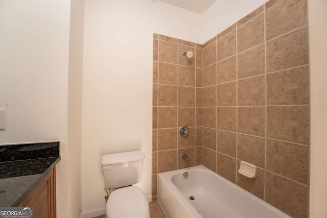 full bath featuring toilet, vanity, and  shower combination