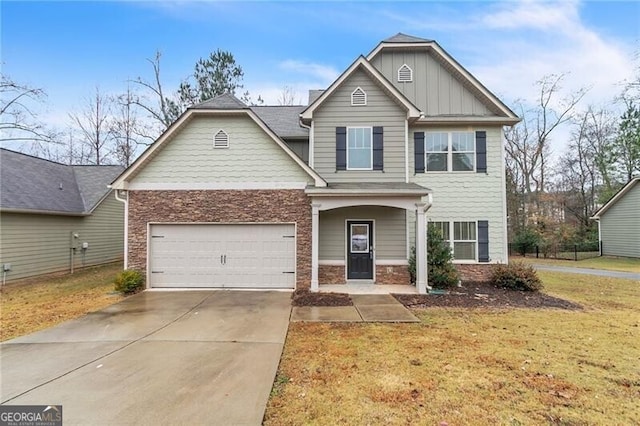 craftsman-style home with stone siding, board and batten siding, concrete driveway, an attached garage, and a front yard