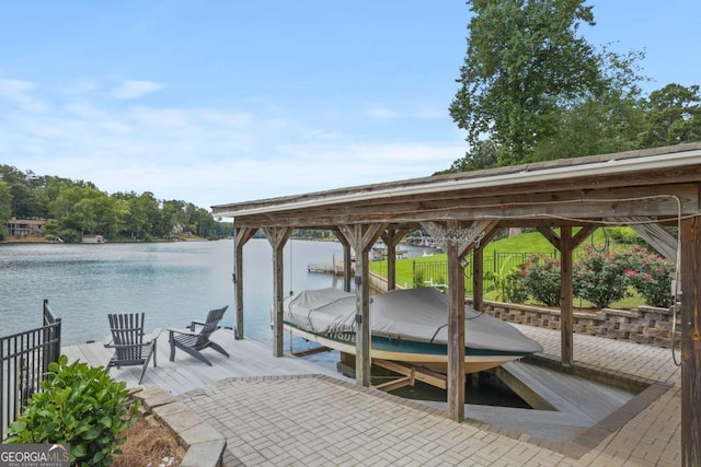 view of dock with a water view and boat lift