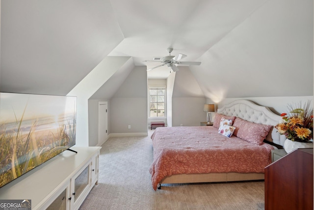 carpeted bedroom featuring visible vents, lofted ceiling, baseboards, and ceiling fan