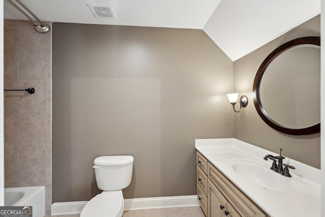 bathroom featuring visible vents, toilet, baseboards, vanity, and vaulted ceiling