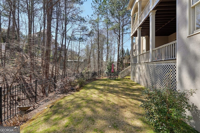 view of yard featuring fence