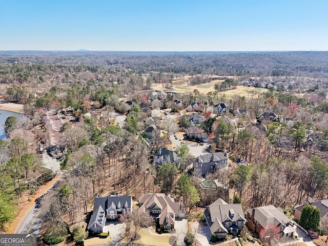 birds eye view of property with a residential view