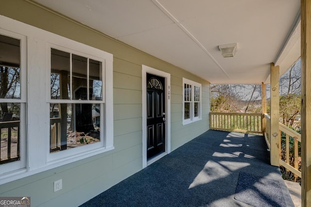 view of patio featuring a porch