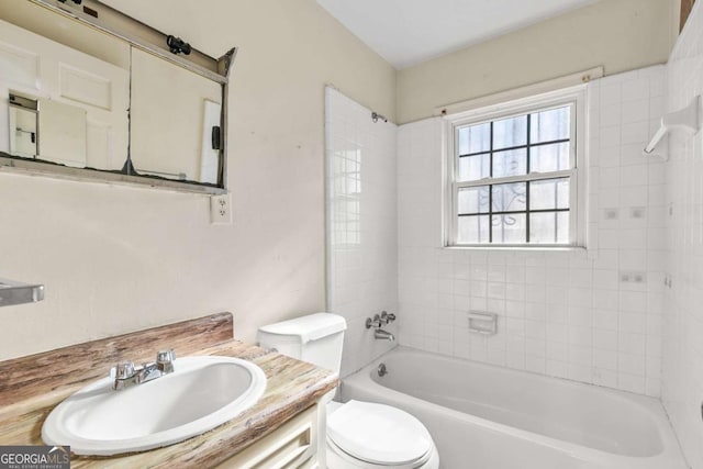 full bath featuring toilet, shower / washtub combination, and vanity