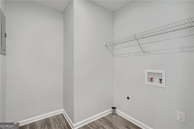 washroom with washer hookup, laundry area, dark wood-style floors, and hookup for an electric dryer