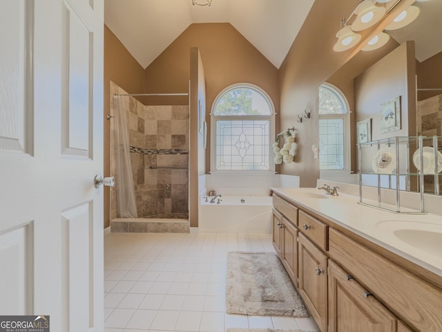 full bath with tiled shower, double vanity, lofted ceiling, tile patterned flooring, and a garden tub