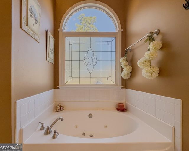 bathroom with a jetted tub