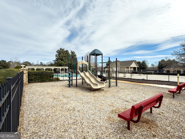 community playground featuring fence