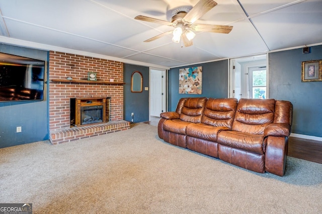 10174 Twin Oaks Dr SW, Covington, GA 30014 - carpeted living room with ceiling fan and a fireplace