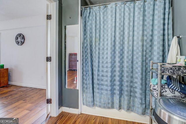 10174 Twin Oaks Dr SW, Covington, GA 30014 - bathroom featuring wood finished floors and baseboards