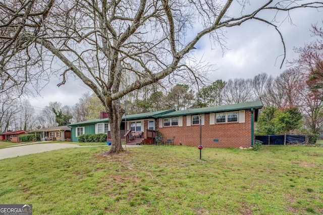 10174 Twin Oaks Dr SW, Covington, GA 30014 - ranch-style home featuring brick siding, crawl space, and concrete driveway