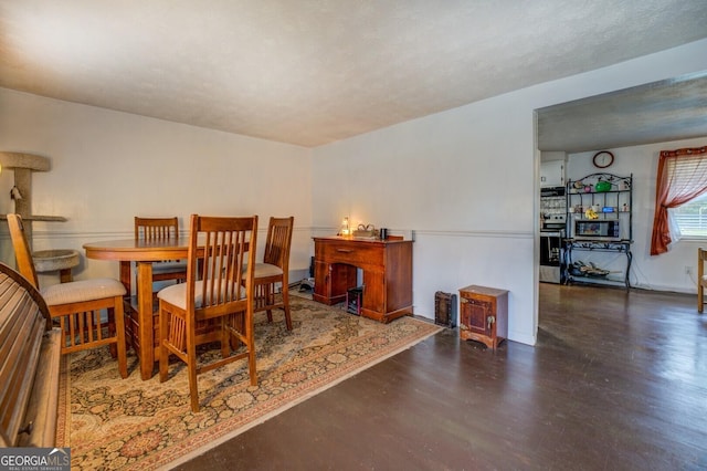 10174 Twin Oaks Dr SW, Covington, GA 30014 - dining space featuring wood finished floors