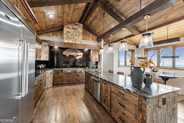 kitchen featuring dark wood-type flooring, wood ceiling, lofted ceiling with beams, stainless steel appliances, and a sink