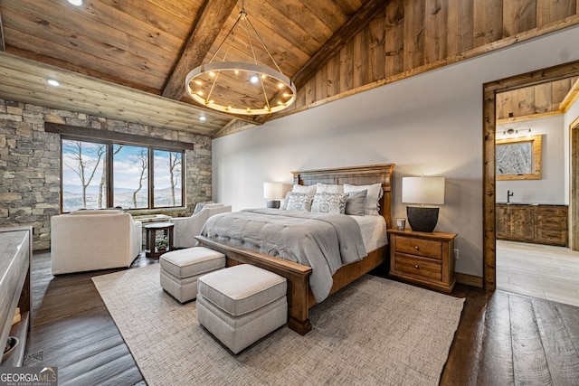 bedroom featuring hardwood / wood-style floors, beamed ceiling, high vaulted ceiling, and wooden ceiling