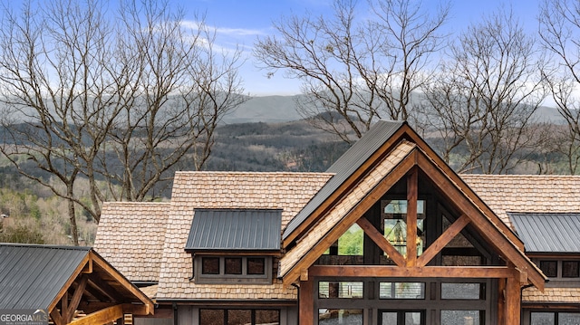 exterior space featuring a mountain view