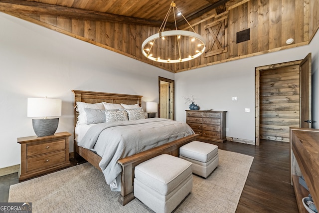 bedroom featuring dark wood-type flooring, baseboards, beamed ceiling, wood ceiling, and a notable chandelier