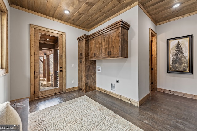 interior space with dark wood-type flooring, hookup for an electric dryer, wood ceiling, and washer hookup