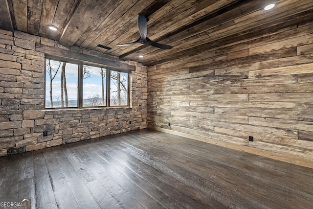 empty room with wooden ceiling, recessed lighting, a ceiling fan, and dark wood-style flooring