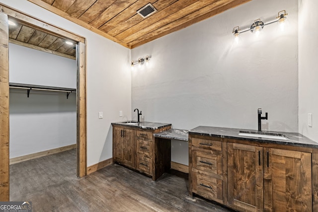 full bathroom with visible vents, baseboards, wooden ceiling, wood finished floors, and vanity