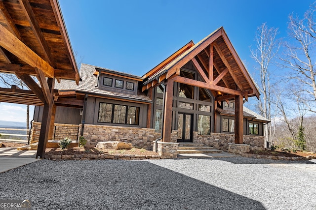 view of front facade featuring stone siding