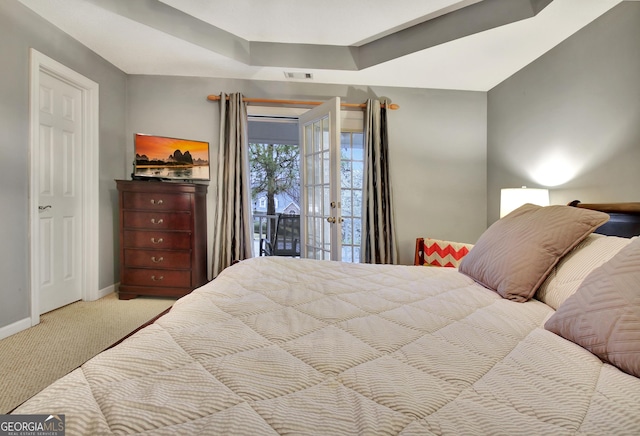 carpeted bedroom with access to outside, baseboards, visible vents, and french doors