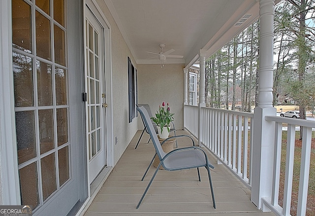 balcony with visible vents and a ceiling fan