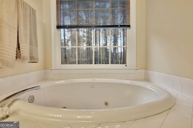 bathroom with a jetted tub