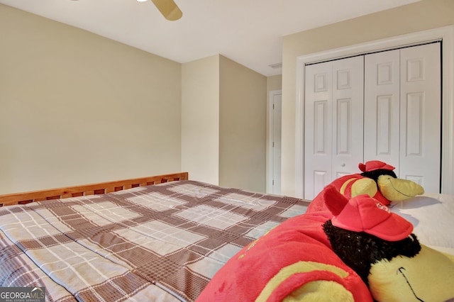 bedroom featuring a closet and a ceiling fan