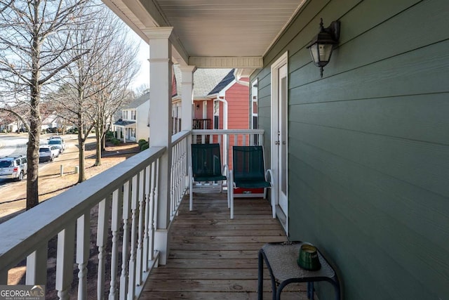 balcony featuring a residential view