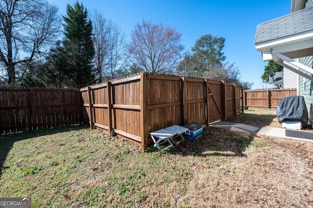 view of yard featuring a fenced backyard