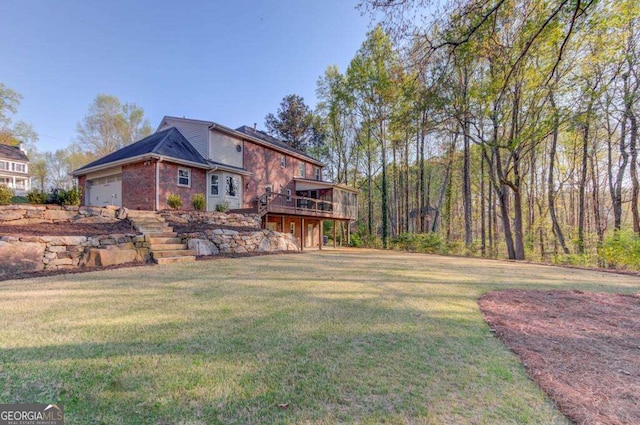 exterior space with brick siding, a garage, a wooden deck, and a front yard