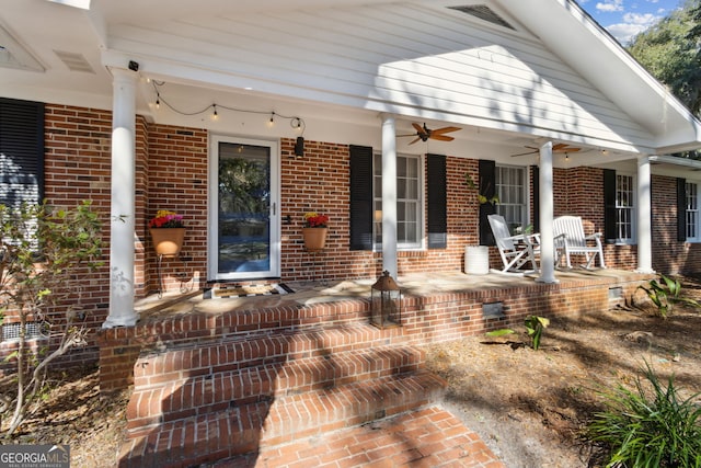 view of patio featuring a porch, visible vents, and ceiling fan