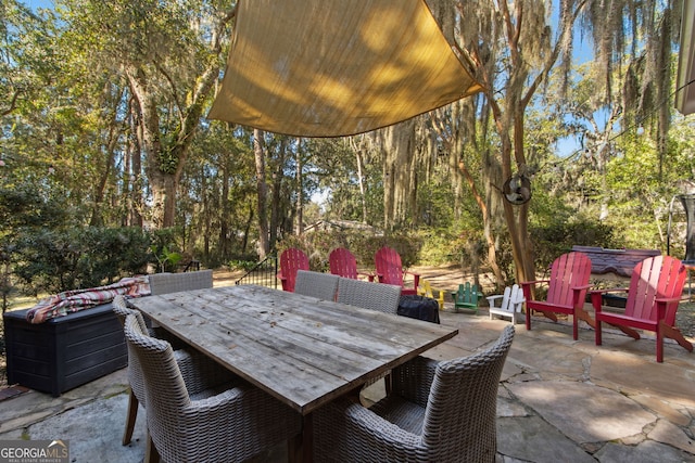 view of patio featuring outdoor dining area