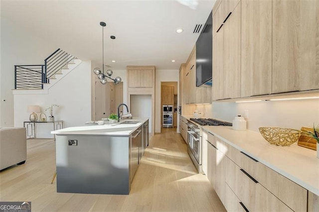 kitchen featuring modern cabinets and light brown cabinets