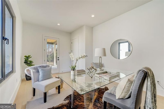 interior space featuring recessed lighting, baseboards, and light wood-type flooring