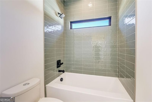 bathroom with toilet and shower / bath combination