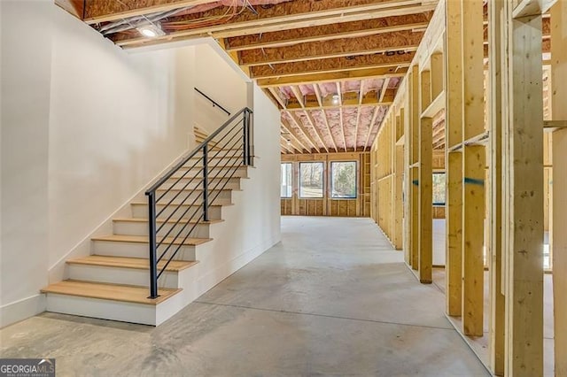 interior space featuring concrete flooring